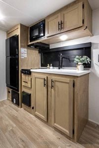 2027 Forest River Cherokee Wolf Pup Black Label 16FQBLW Small Camper Interior Image