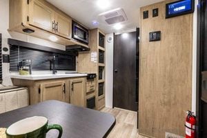 2027 Forest River Cherokee Wolf Pup Black Label 16CMBL Small Camper Interior Image