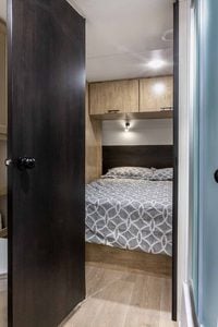 2026 Forest River Cherokee Grey Wolf Black Label 23MKBL Couples Travel Trailer Interior Image