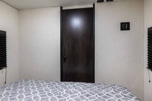 2026 Forest River Cherokee Grey Wolf Black Label 23MKBL Couples Travel Trailer Interior Image