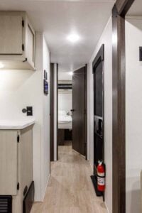 2027 Forest River Cherokee Alpha Wolf 28RLX Rear Living Room Couples Travel Trailer Interior Image