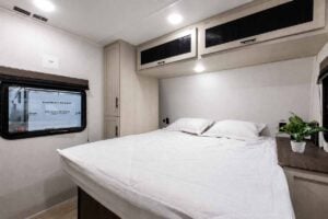 2027 Forest River Cherokee Alpha Wolf 28RLX Rear Living Room Couples Travel Trailer Interior Image