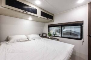 2027 Forest River Cherokee Alpha Wolf 28RLX Rear Living Room Couples Travel Trailer Interior Image