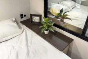 2027 Forest River Cherokee Alpha Wolf 28RLX Rear Living Room Couples Travel Trailer Interior Image